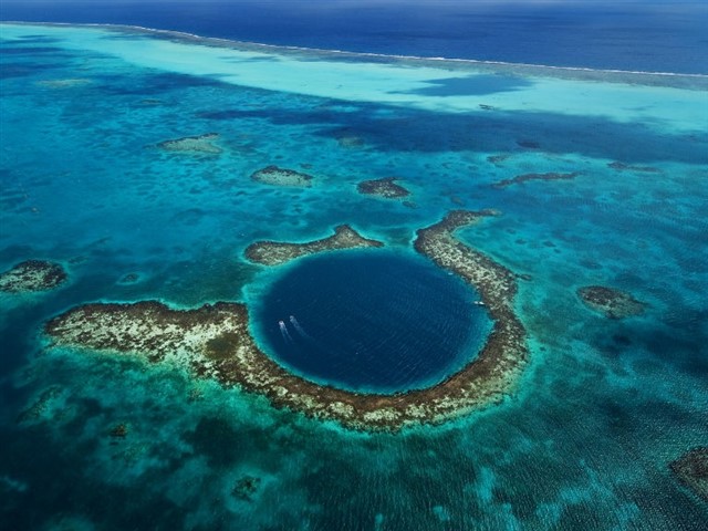 Belize Barrier Reef The Belize Barrier Reef is a 300 kilometer (190 miles) long section of the Mesoamerican Barrier Reef System, the second largest coral reef system in t...