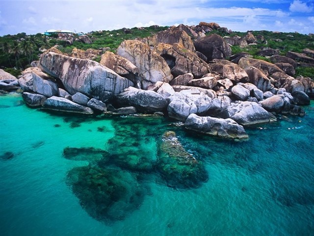 British Virgin Islands The British Virgin Islands poke their jungle-clad heads above the swells where the North Atlantic Ocean meets the Caribbean Sea.<br /><br />Blown over...