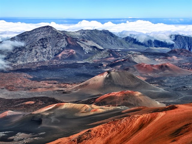 Haleakala National Park Haleakala is shield volcano that forms more than half of the island of Maui. Also known as the East Maui Volcano, this summit tops more than 10,000 fe...