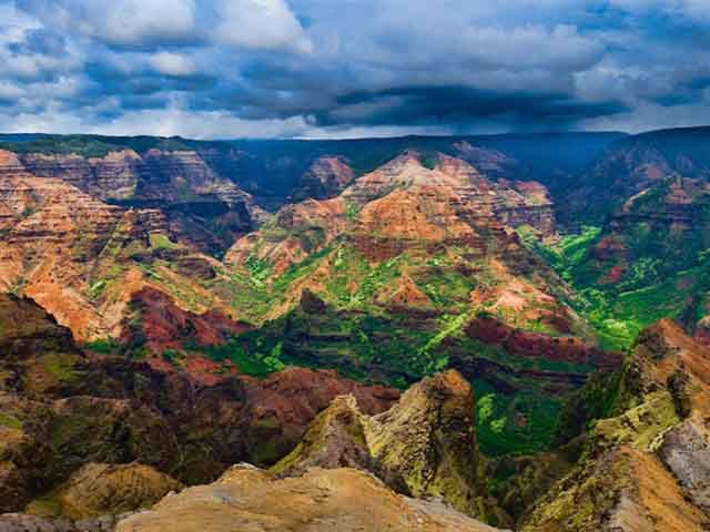 Waimea Canyon Just a few miles inland of the Na Pali Coast of Kauai is Waimea Canyon. Also known as the Grand Canyon of the Pacific, Waimea Canyon is one of the mos...