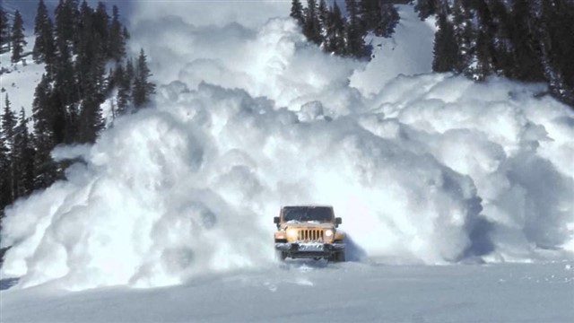 Avalanche An avalanche is a geophysical hazard involving a slide of a large snow or rock mass down a mountainside, caused when a buildup of material is released...