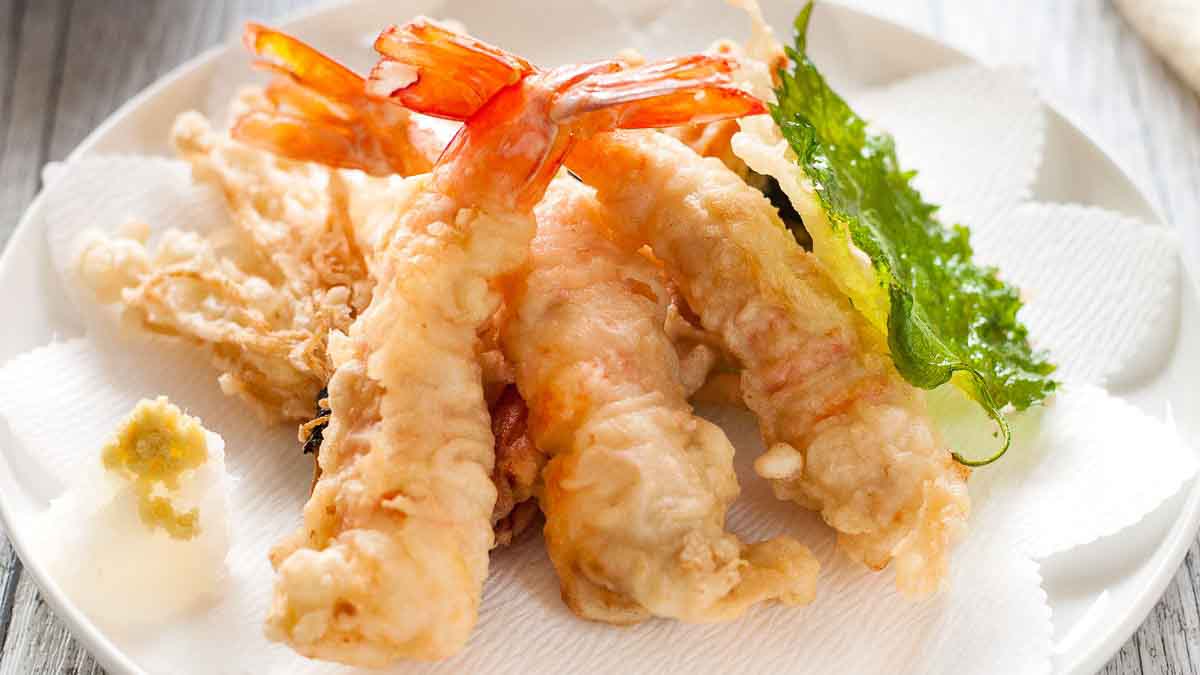 Tempura (å¤©ã·ã‚‰ or å¤©éº©ç¾… tenpura, [táº½ÌžmpÉ¯áµÉ¾a]) is a Japanese dish usually consisting of seafood or vege...